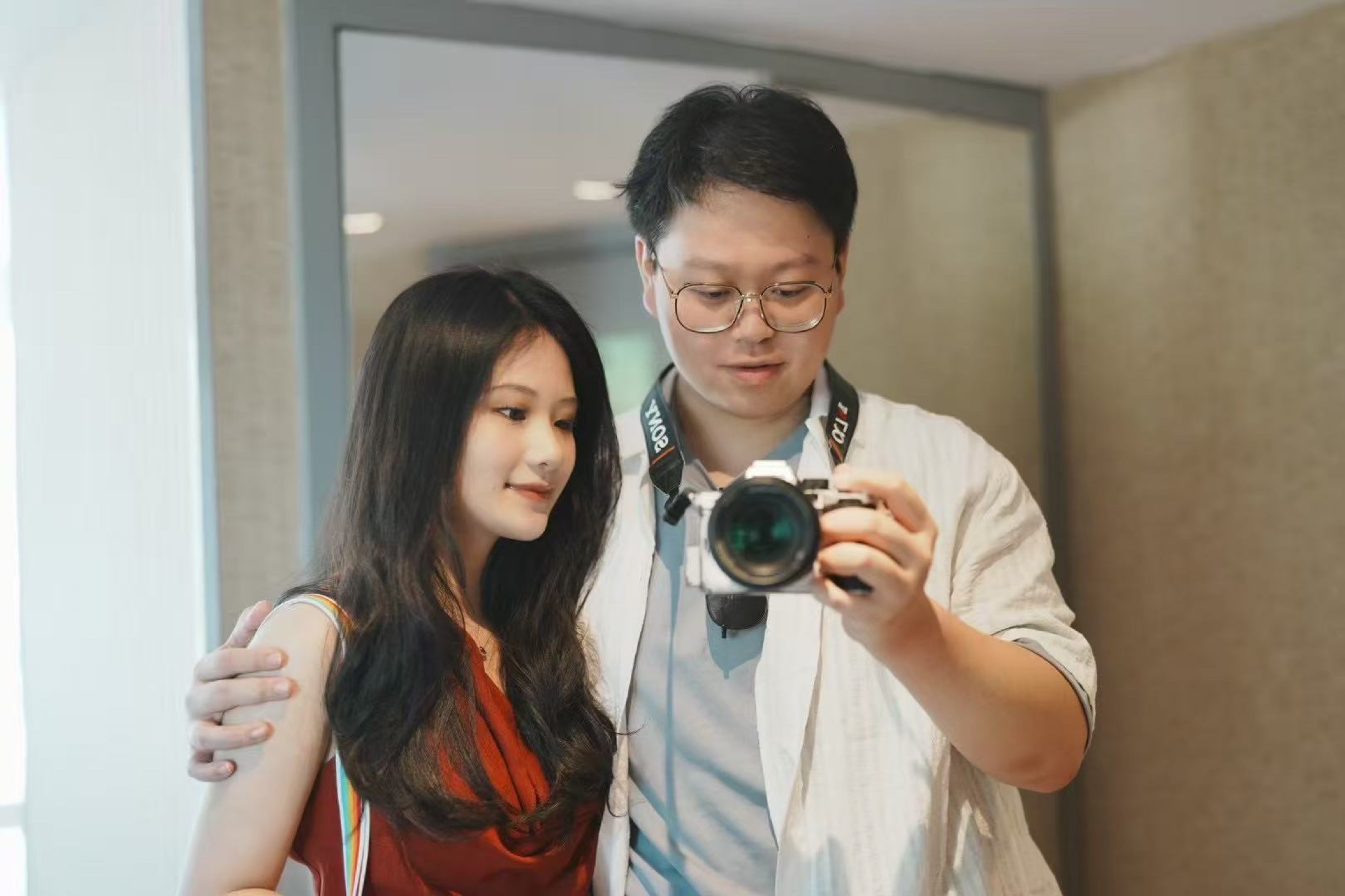 Pang Yiwei holding a camera
